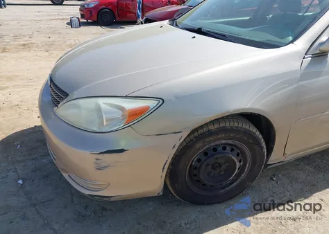 2003 Toyota Camry Le z USA, uszkodzony, nr VIN 4T1BE32K03U760397